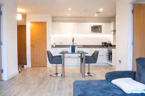Kitchen and breakfast bar of the Manchester apartment