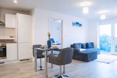 Open-plan living and dining space managed by Oasis Haven